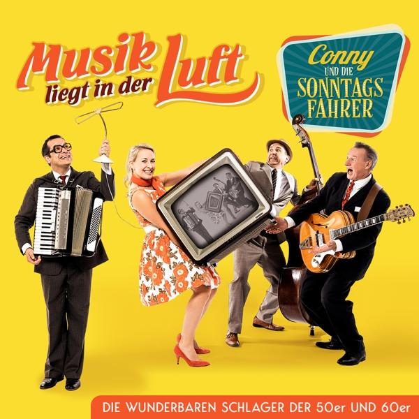 Albumcover: Band spielt Musik. Titel: Musik liegt in der Luft. Text: Die wunderbaren Schlager der 50er und 60er.