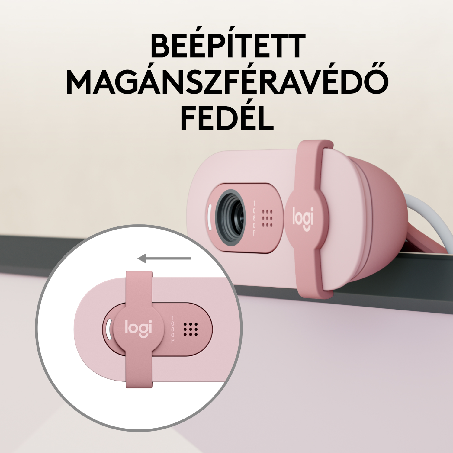 Rózsaszín webkamera adatvédelmi fedéllel és a 'Logi' szóval.