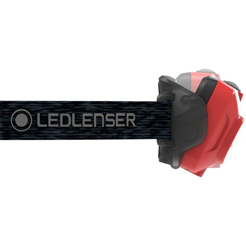 LEDLENSER fejlámpa fekete szíjjal, piros és fekete lámpaházzal.