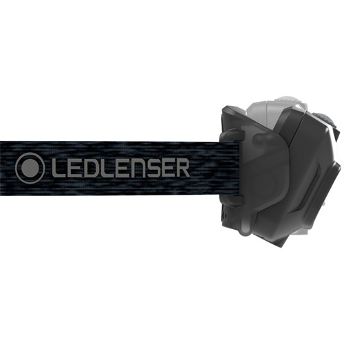 Fejlámpa fekete pánttal, szürke fénnyel és a LEDLENSER logóval, ferde nézet.