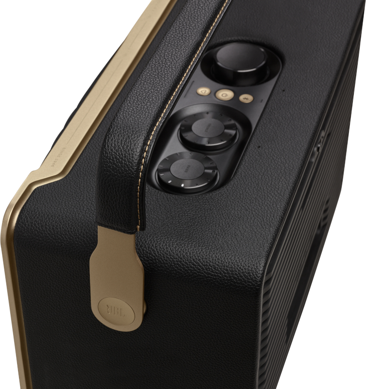 Nahaufnahme eines schwarzen und goldenen Marshall-Lautsprechers. Er hat Knöpfe, einen Griff und das JBL-Logo.