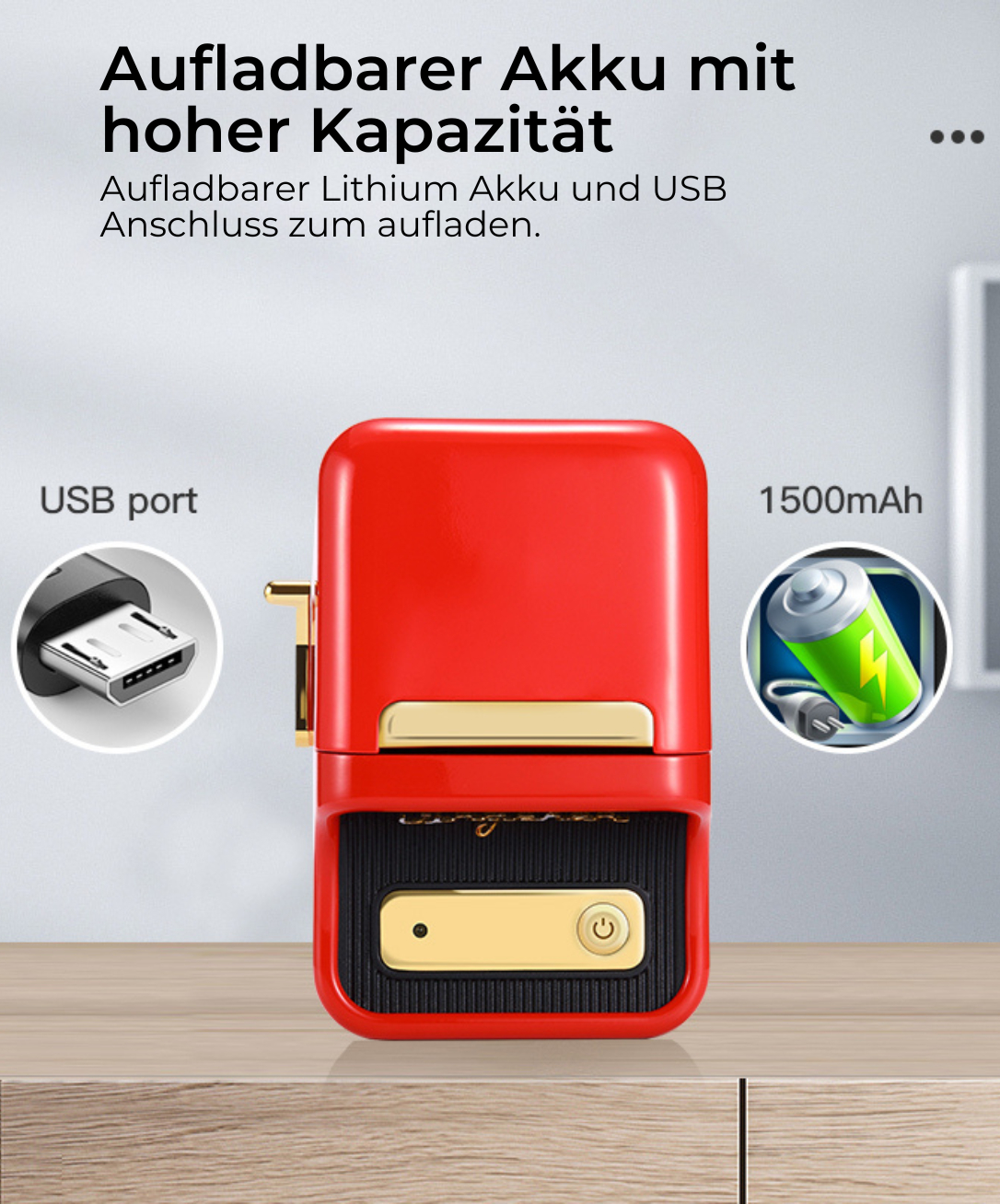 Rotes, rechteckiges Gerät mit USB-Anschluss, Ein-/Aus-Taste und Akku-Symbol neben einem USB-Kabel.