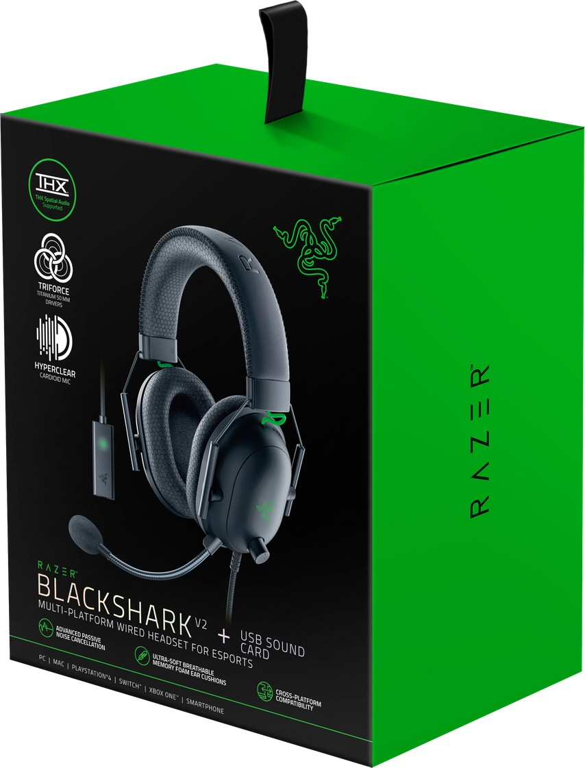 Grüne Box mit schwarzen Gaming-Kopfhörern, mit Mikrofon und USB-Soundkarte.