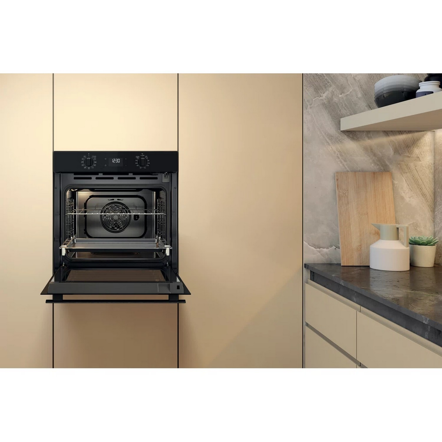 Built-in oven with door open. It is in a kitchen cabinet with beige doors. Oven is black with a digital display.