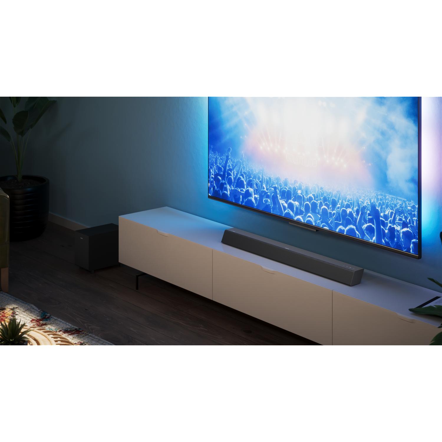 Woonkamer met een tv, soundbar en subwoofer. Wit meubel, blauwe en paarse sfeerverlichting.