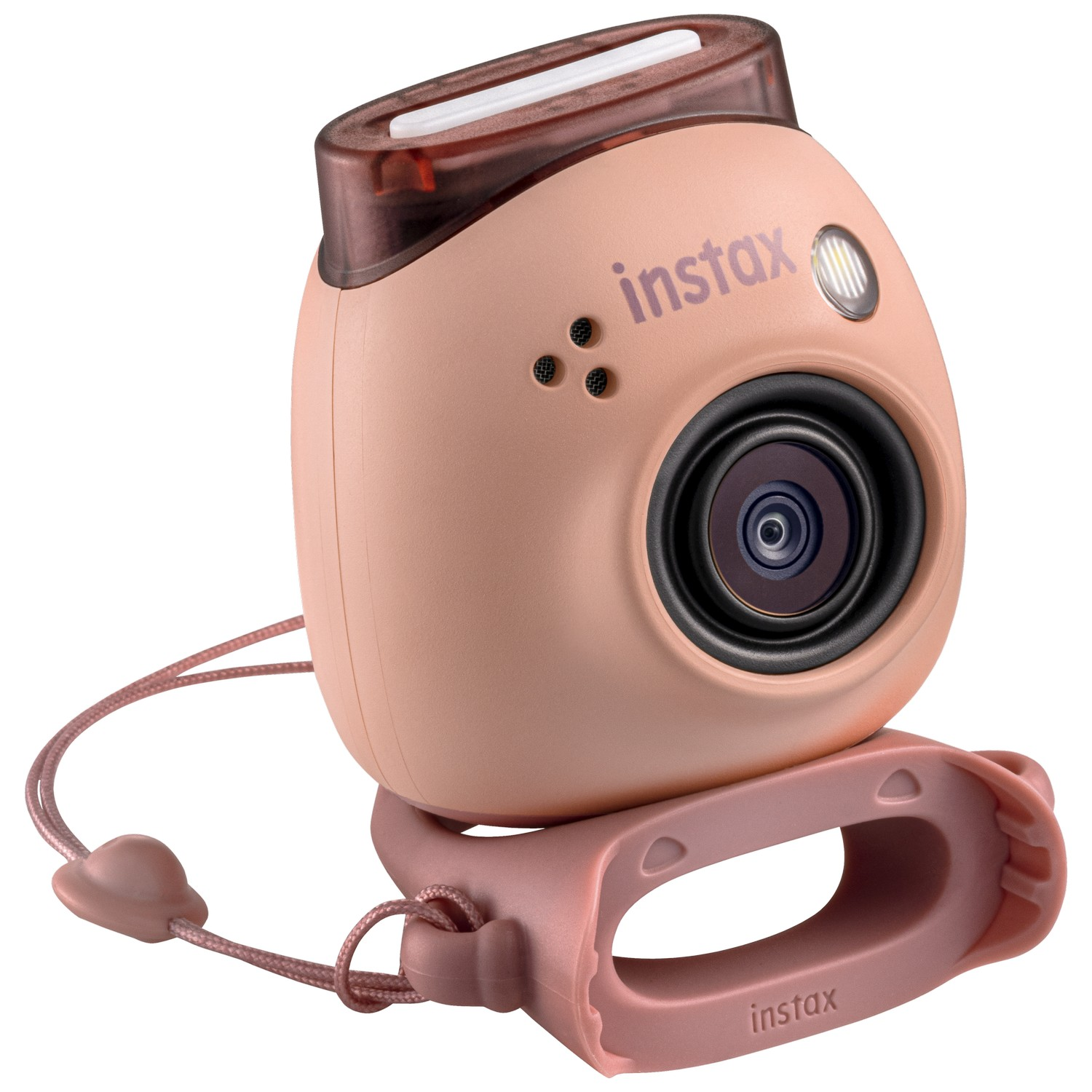Roze Instax-camera met lens, flitser en polsband. De camera zit op een roze handgreep.