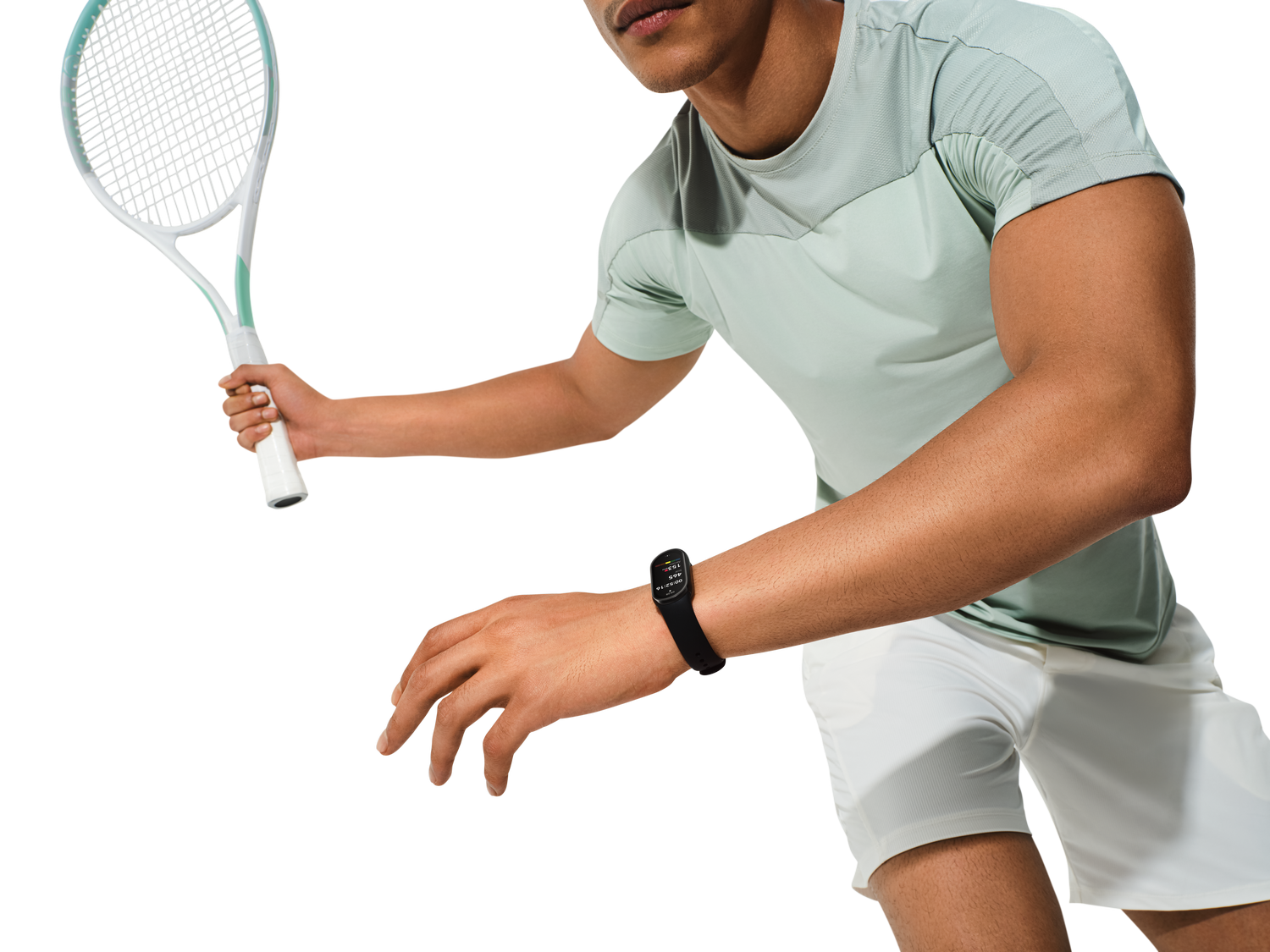 Jugador de tenis en acción, raqueta en mano, reloj deportivo.