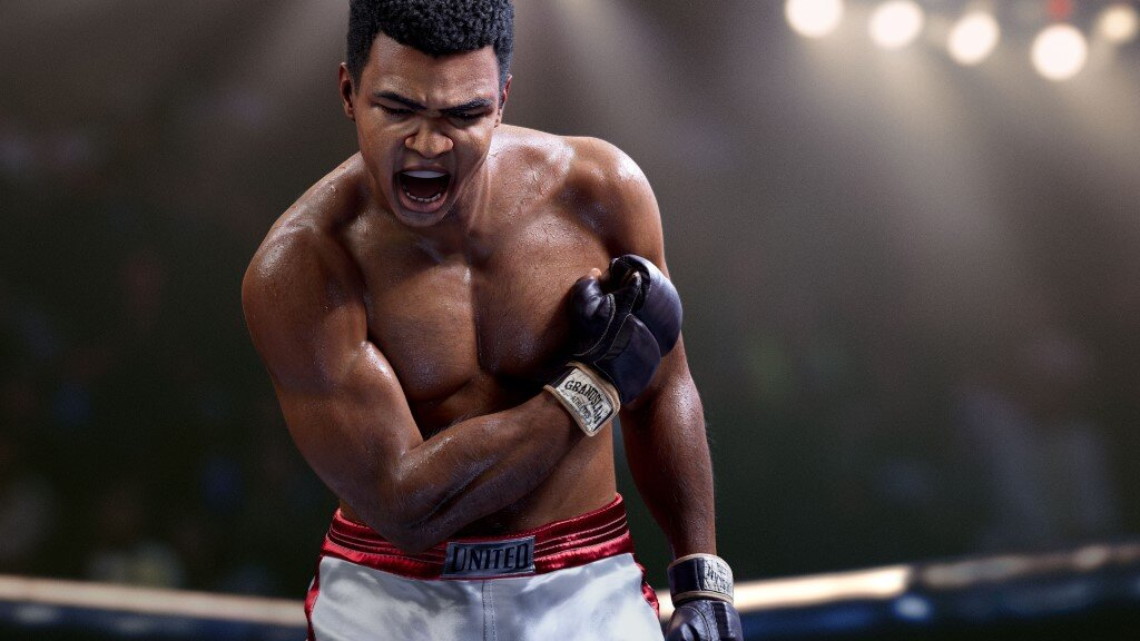 Muhammad Ali na ringu bokserskim, krzyczący i trzymający się za klatkę piersiową, w rękawicach.