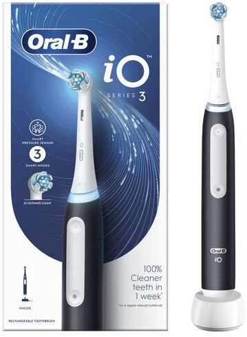 Szczoteczka elektryczna z bazą ładującą i pudełkiem, z tekstem.