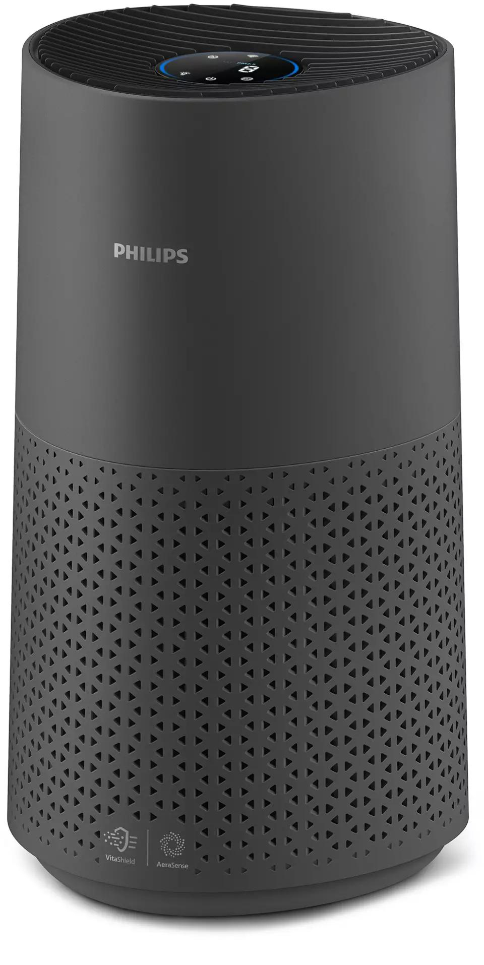 Dunkelgrauer Philips Luftreiniger mit Gittermuster am Sockel.