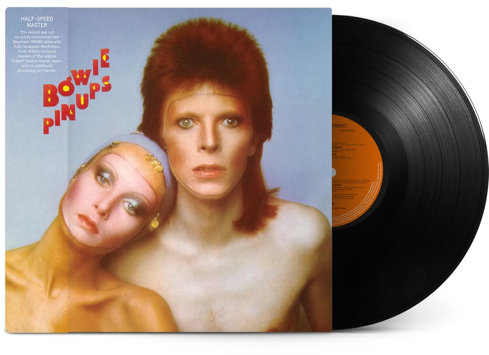David Bowie album borítója, Bowie és egy sminkelt nő; a jobb oldalon egy bakelit.