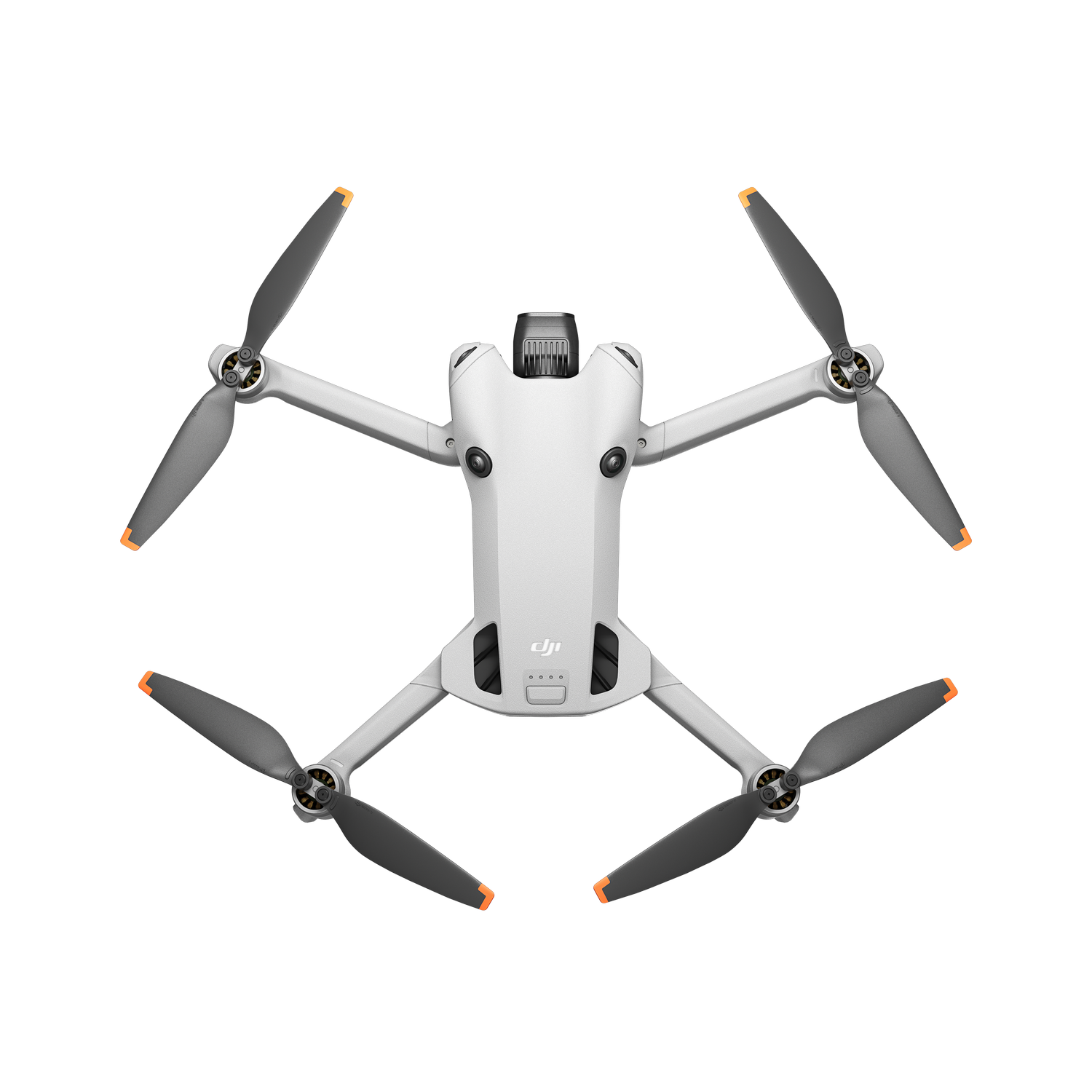 Dron blanco con hélices. Puntas naranjas en las hélices. Fondo negro. Logotipo DJI en el dron.