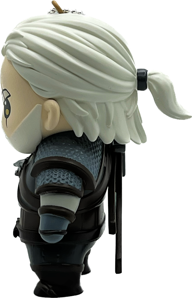 Witcher figura, fehér hajú férfi, oldalnézet, páncélt visel, fekete háttér.