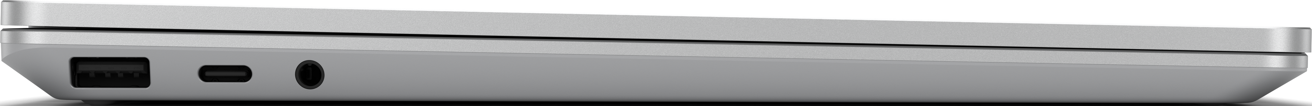 Seitenansicht eines grauen Laptops mit Anschlüssen für Strom, USB-C und Audiobuchse.