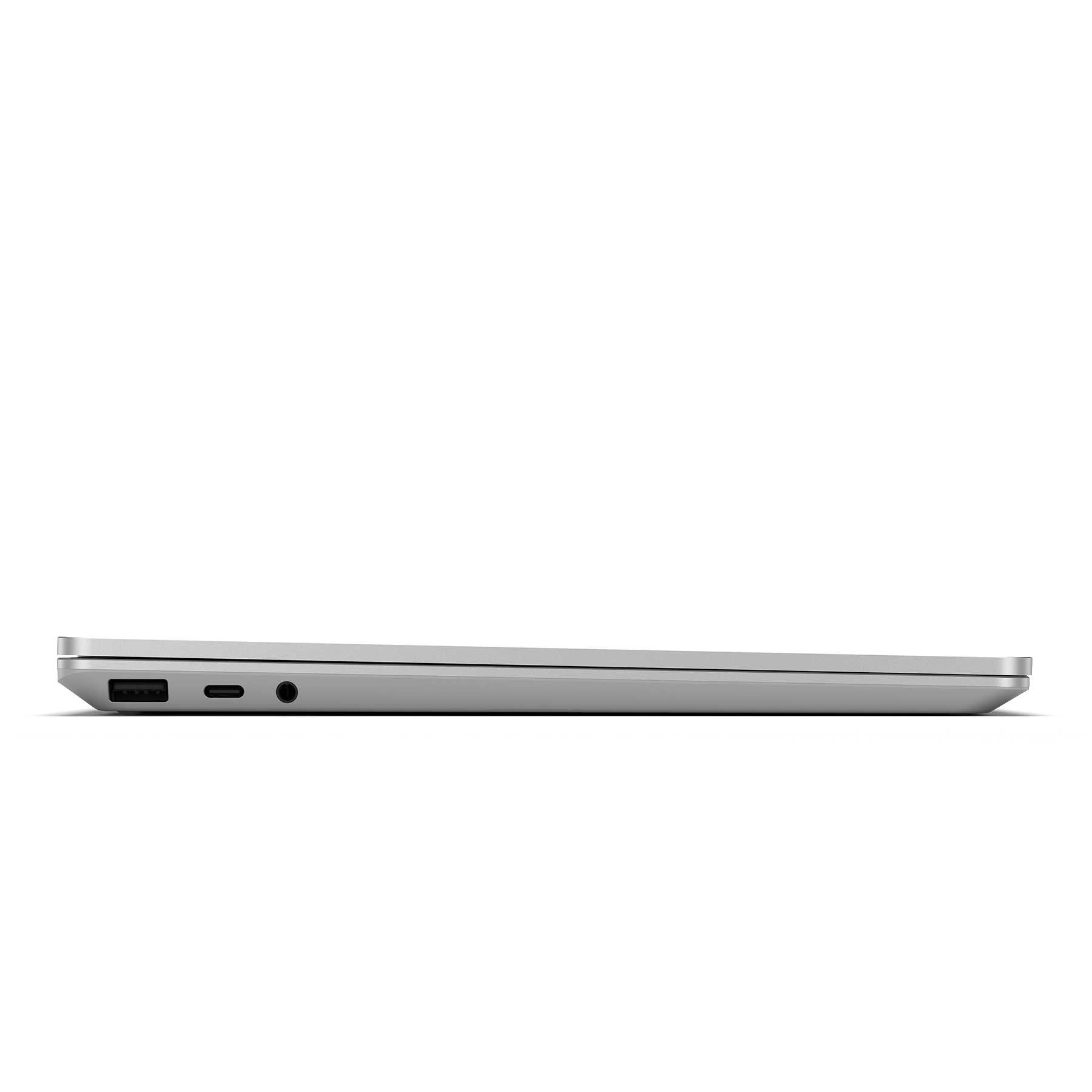 Laptop-Seitenansicht, zeigt Anschlüsse. Der Laptop ist silberfarben.