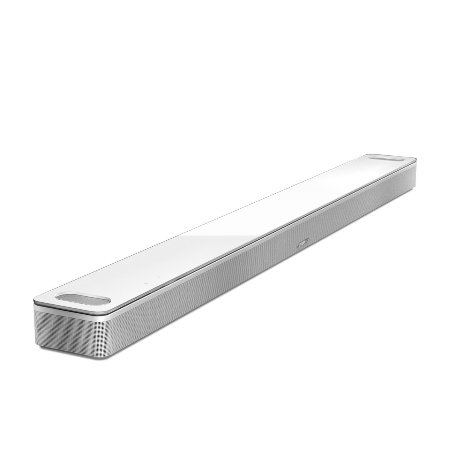 A long, white soundbar with a glossy top surface. The edges are silver and perforated.
