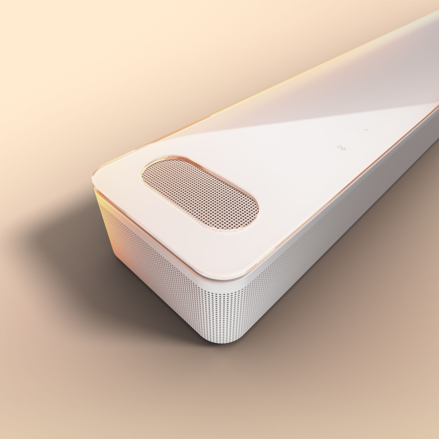 White soundbar with rounded corners, speaker grill, and a gold-colored trim.