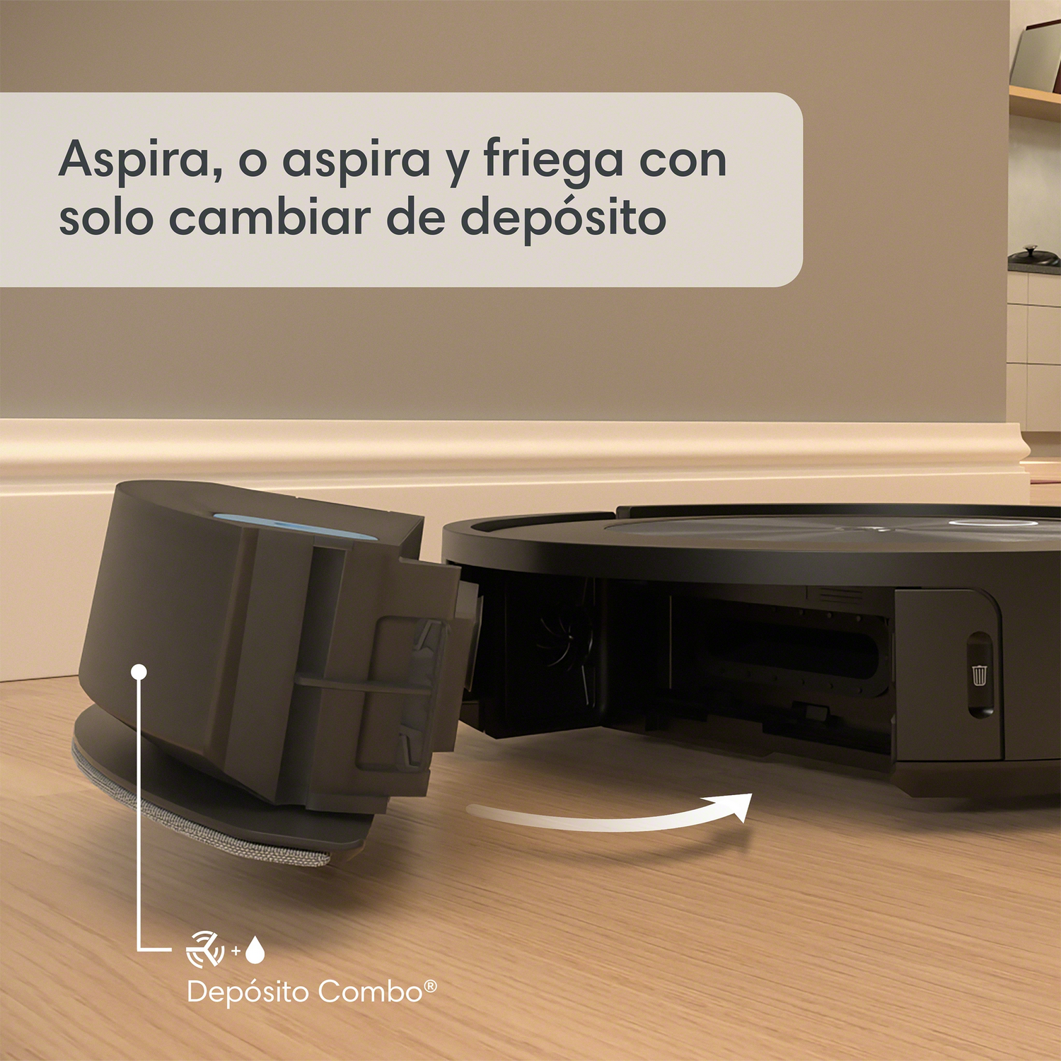 Aspiradora robot con depósito combinado desmontado, mostrando una flecha blanca indicando el cambio.