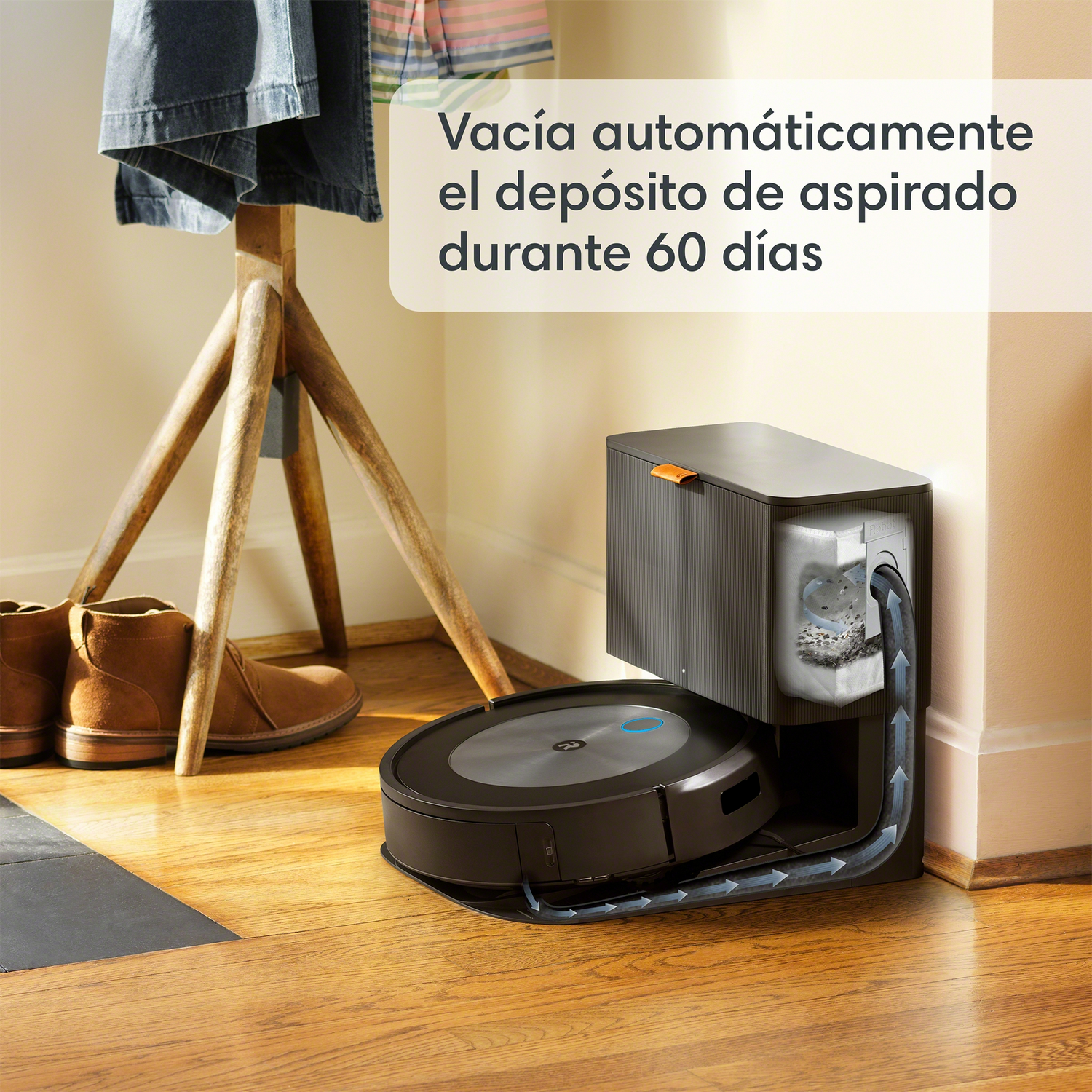 Aspiradora robot y estación de carga. Texto sobre eliminación automática de residuos.