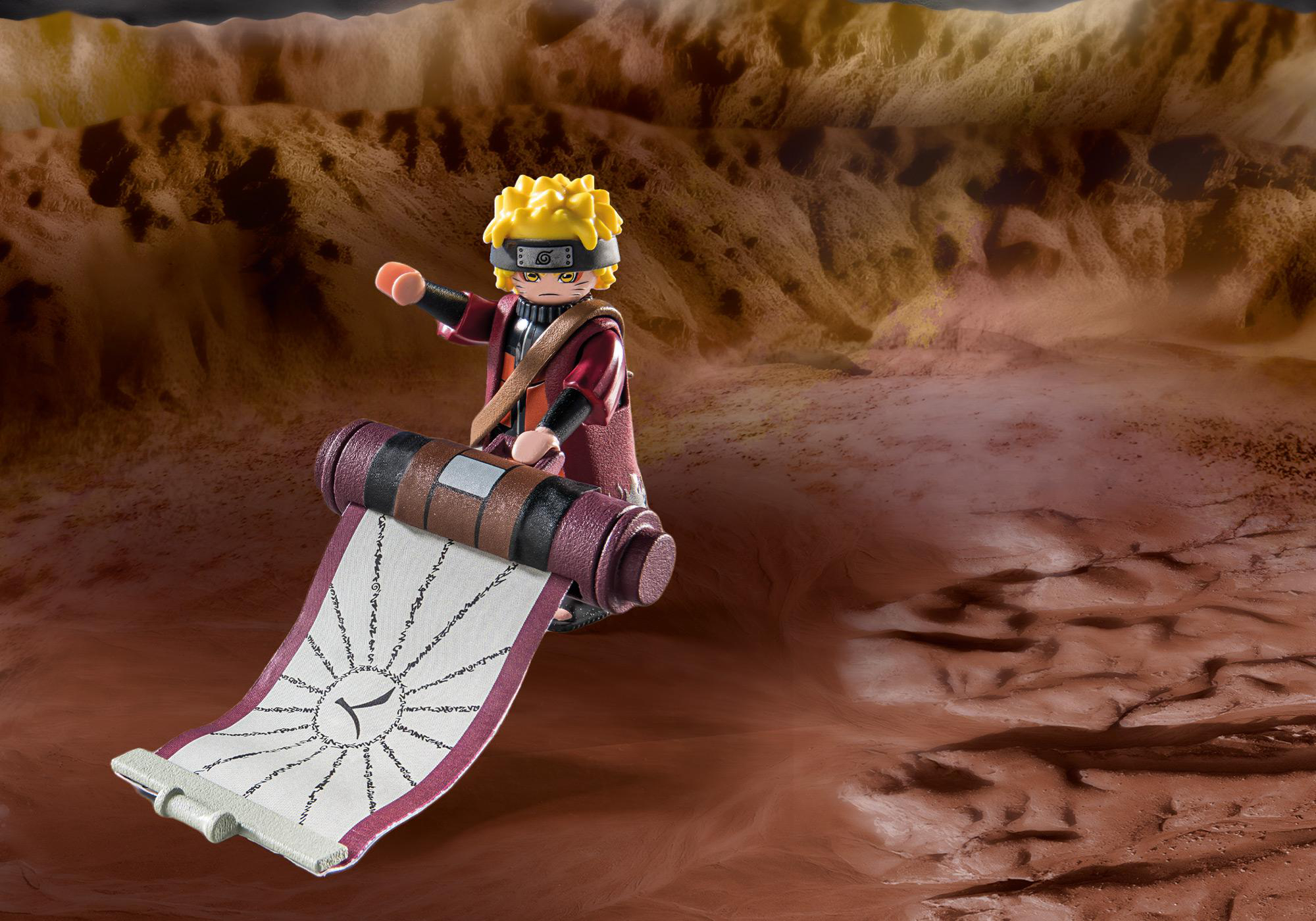 Naruto-Spielfigur mit Schriftrolle auf braunem Gelände im Hintergrund.