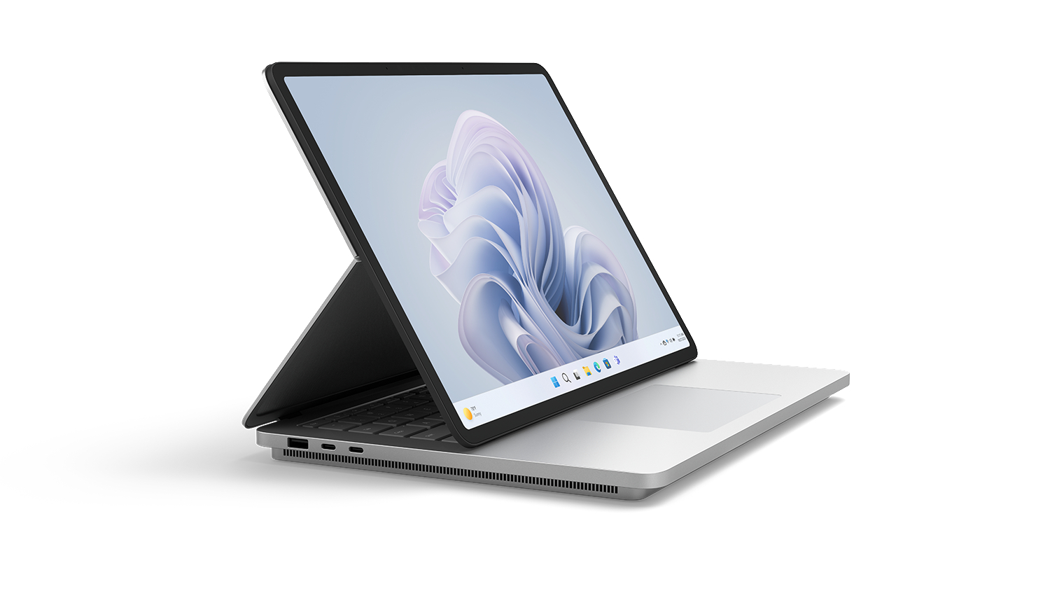Laptop offen, Bildschirm nach oben, auf weißer Oberfläche. Zeigt einen Hintergrund. Silbernes Gehäuse.