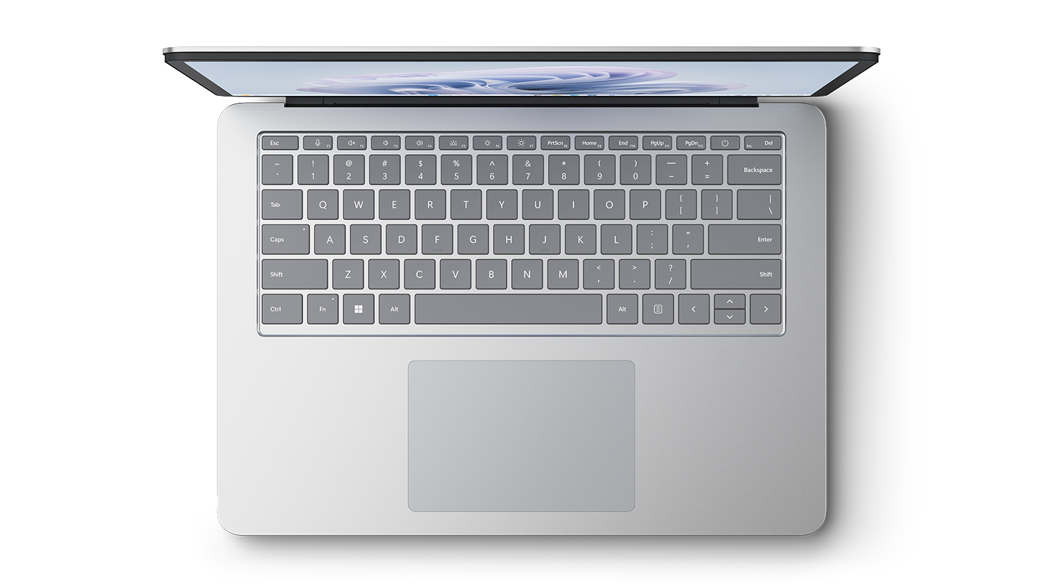 Draufsicht auf einen silbernen Laptop mit geöffnetem Bildschirm, der Tastatur und Trackpad zeigt.