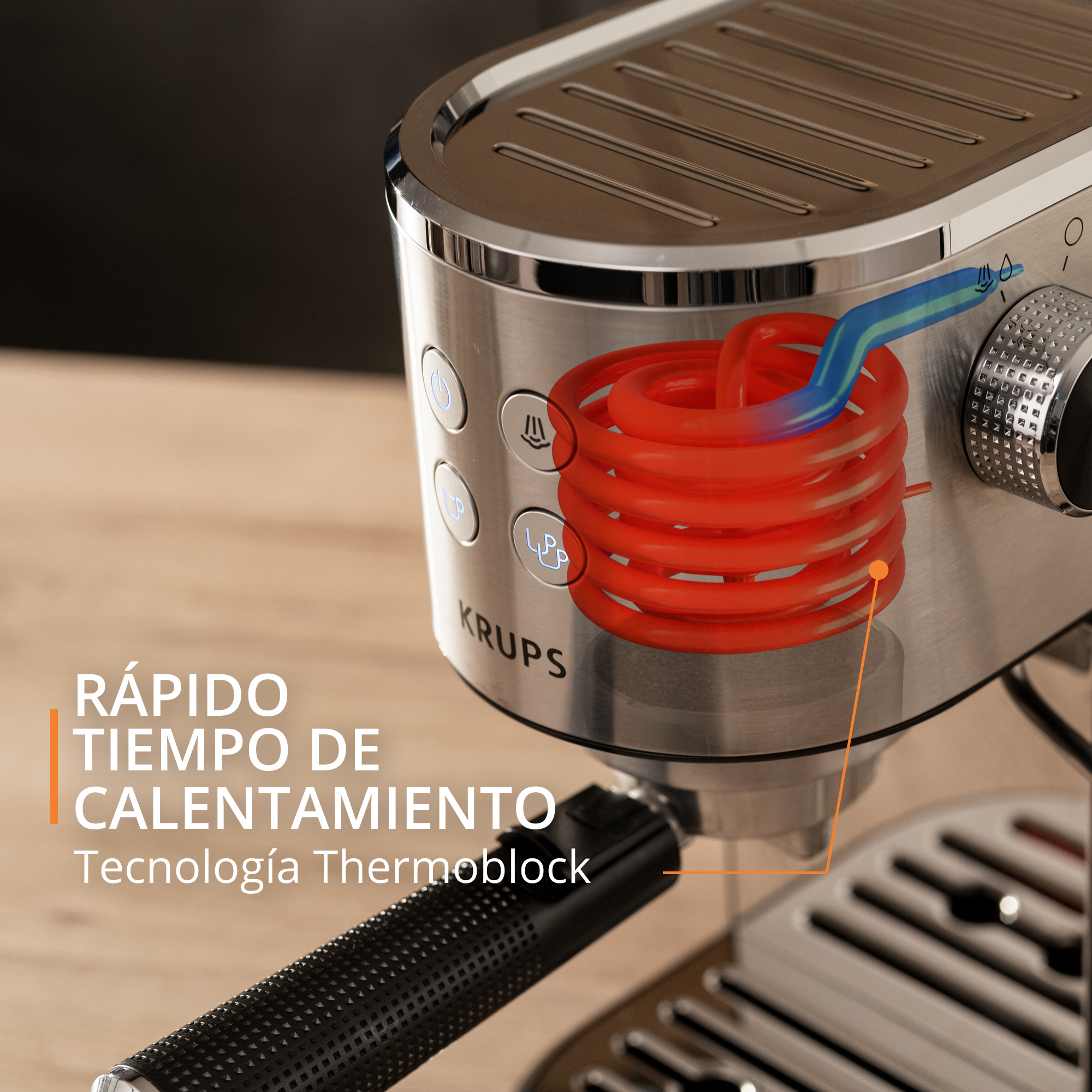 Primer plano de una cafetera espresso Krups con gráfico de bobina roja, texto sobre calentamiento rápido.