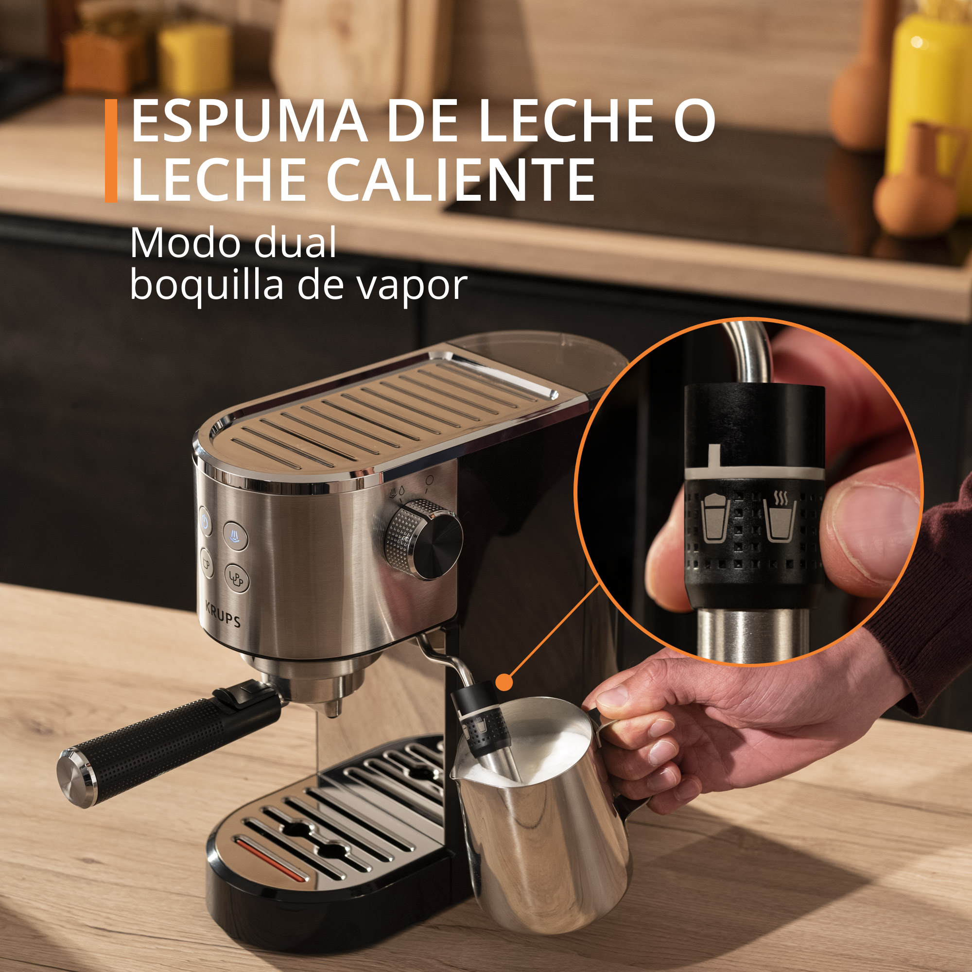 Máquina de espresso con accesorio para espumar leche. Muestra la boquilla de vapor y la espuma de leche en acción.