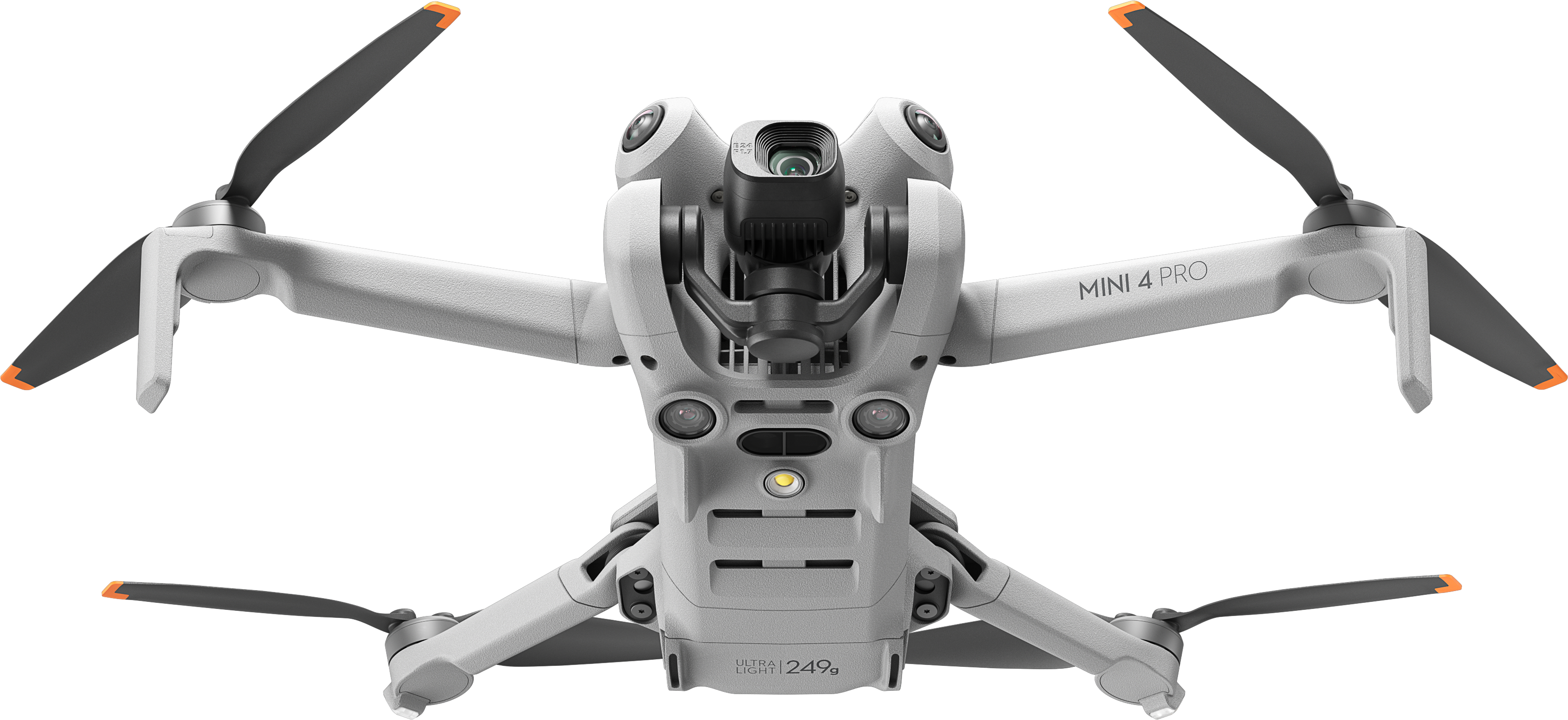 Gros plan d'un drone gris vu de dessus, avec des hélices noires. Fond noir.
