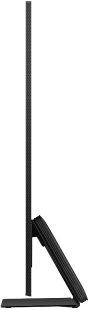 Widok z boku czarnego monitora z cienką ramką i podstawką. Czarne tło.