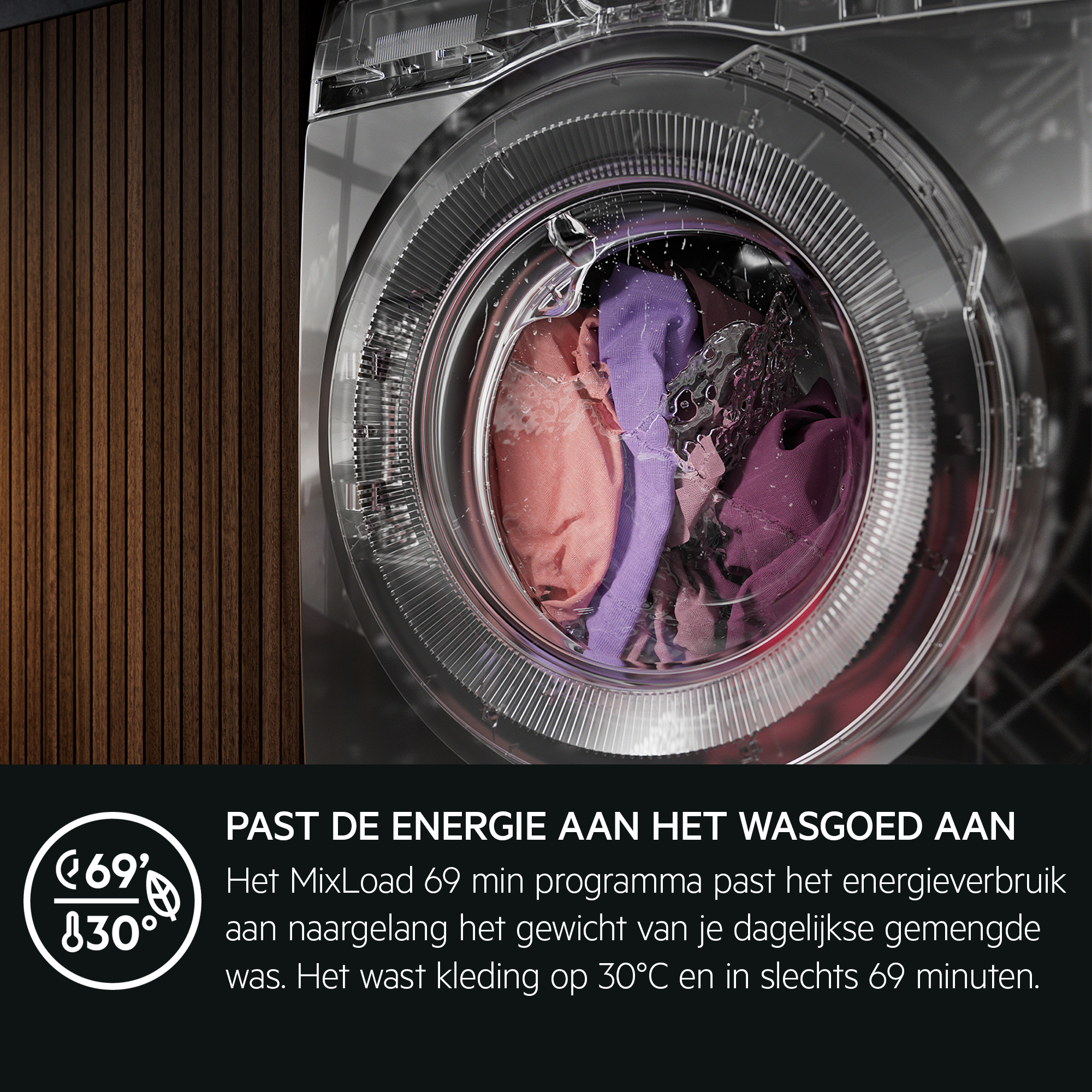 Washing machine with clothes inside. The machine's display shows '69' and '30°'.