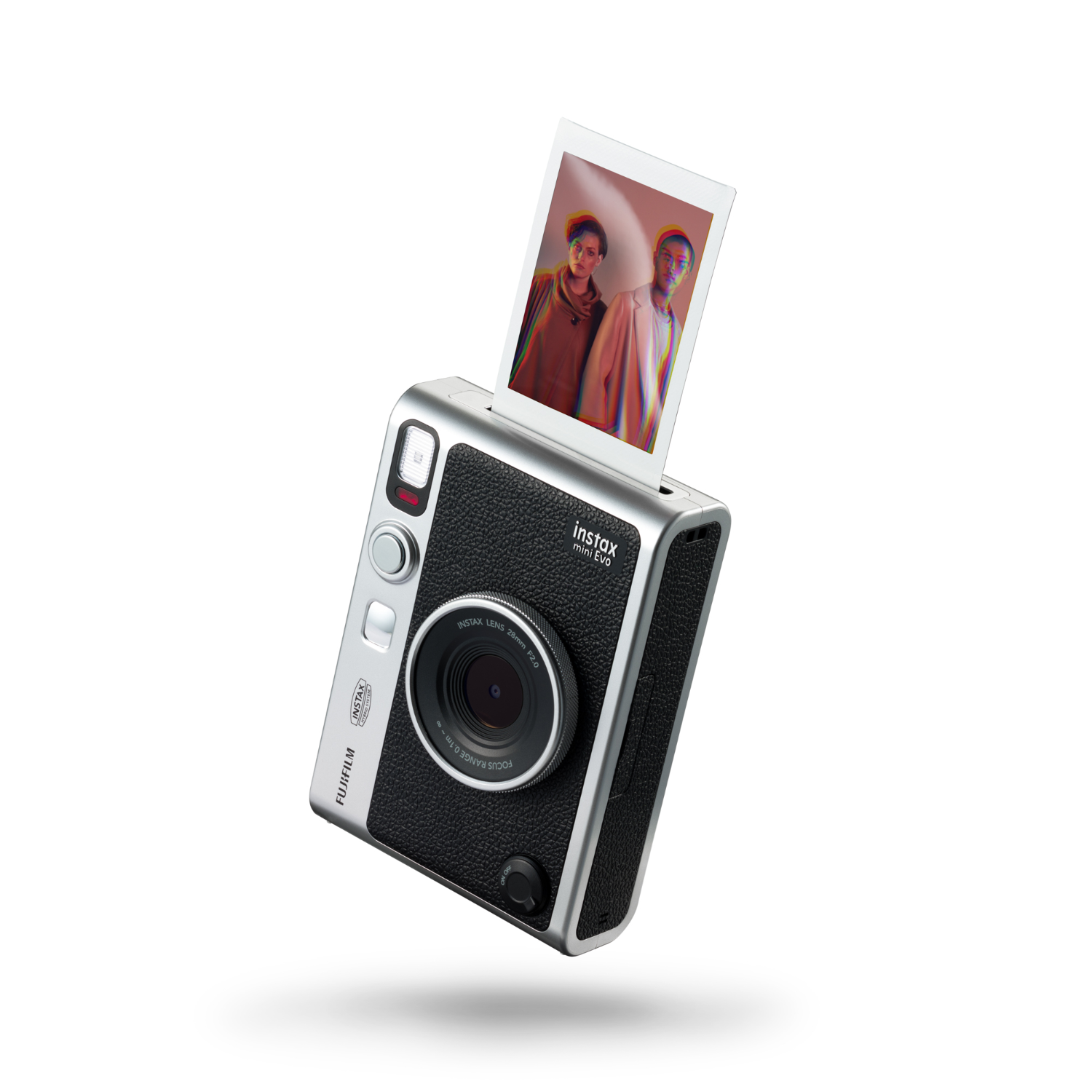 Zilveren en zwarte instant camera die een foto afdrukt.
