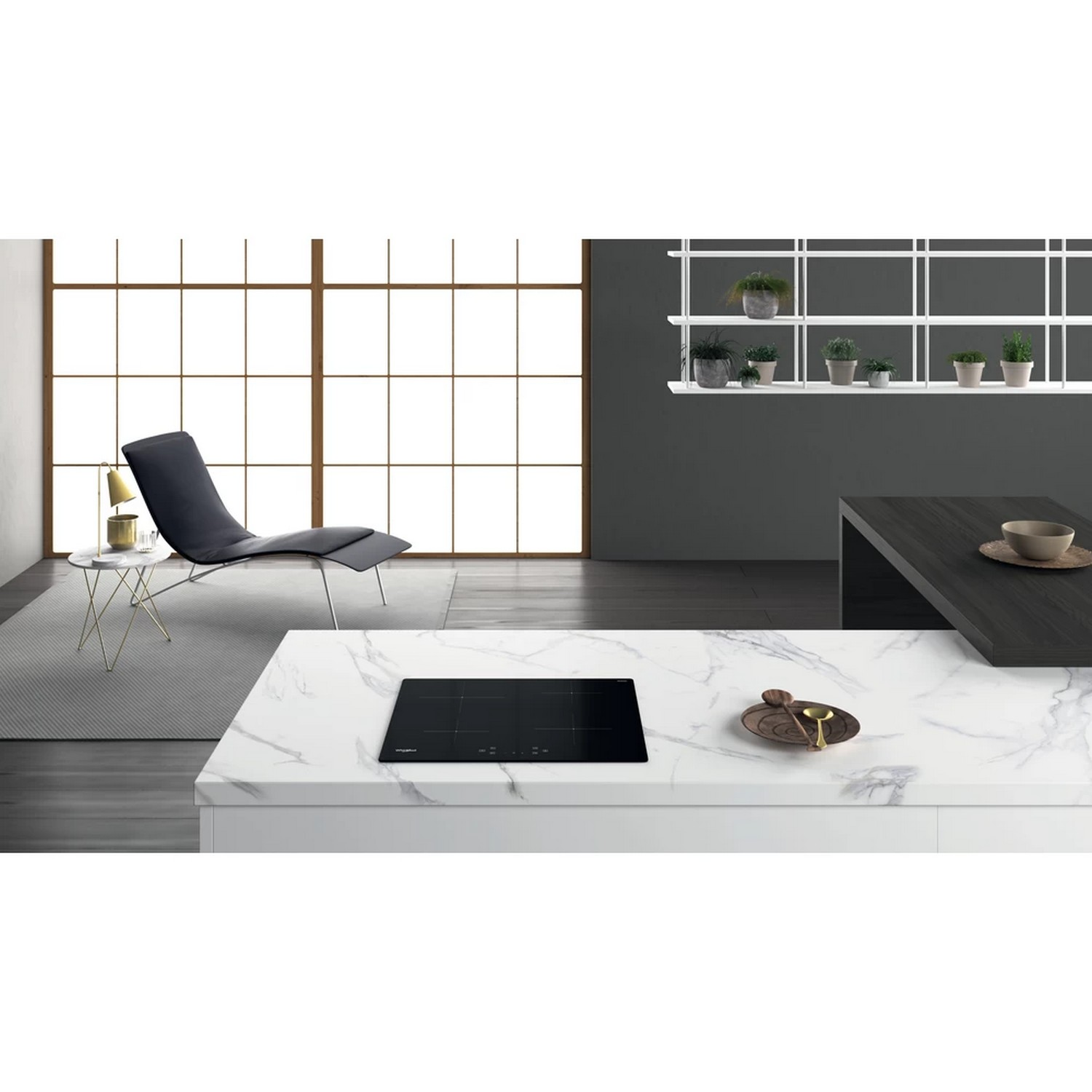 Modern kitchen with marble countertop and built-in hob. Chair, table, and shelves.