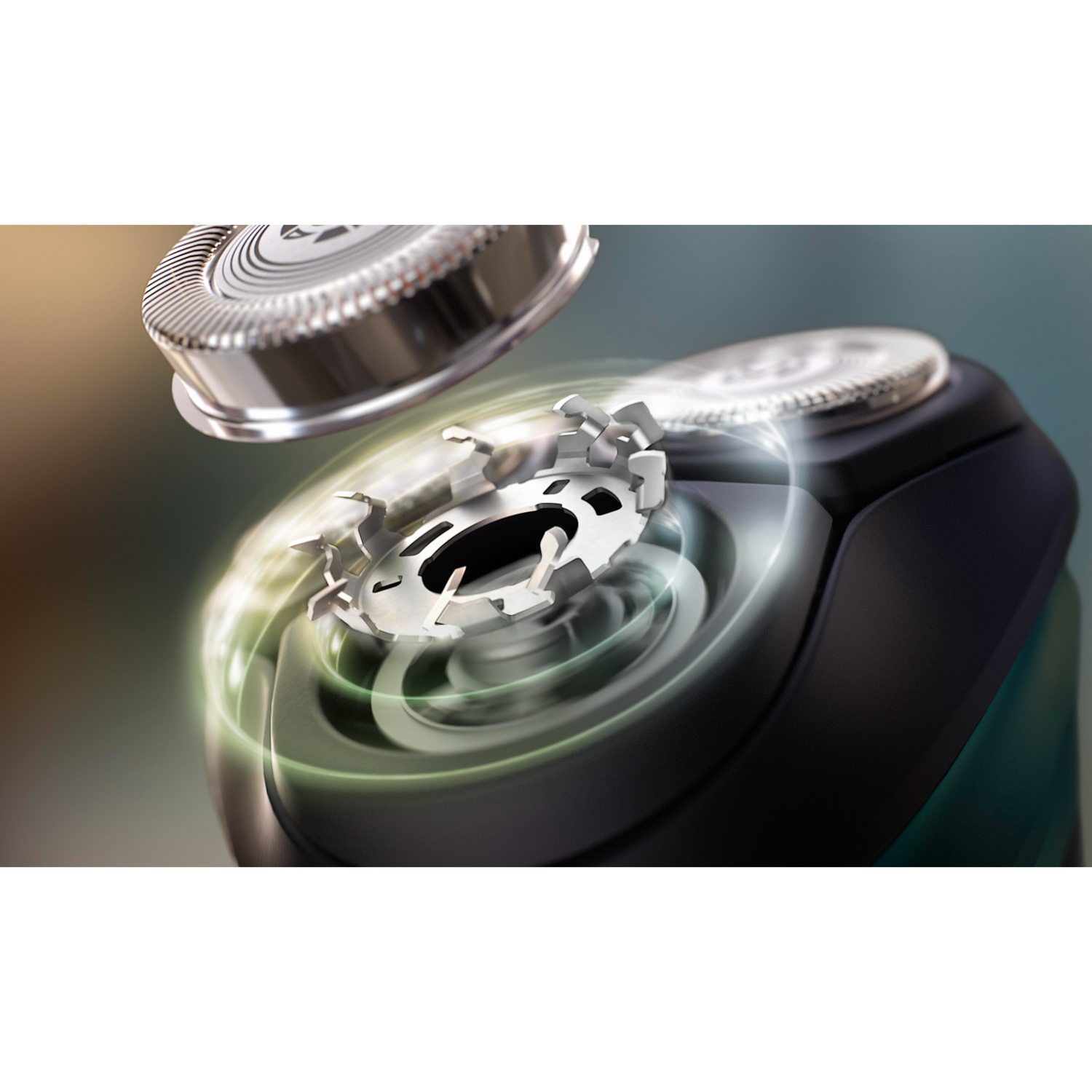 Close-up of a shaver head with internal blades, green light effect.