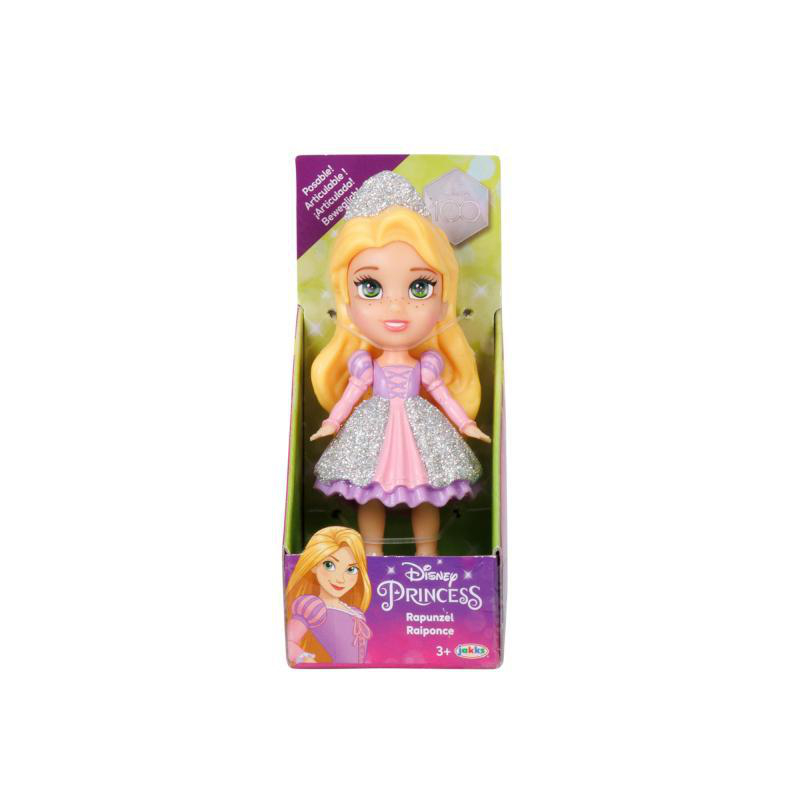 Disney Princess Rapunzel Puppe in einer Box, lächelnd, mit langen blonden Haaren.