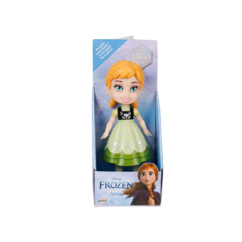 Eine Frozen Anna-Puppe in einer Box, mit Text in mehreren Sprachen und einem Anna-Bild.