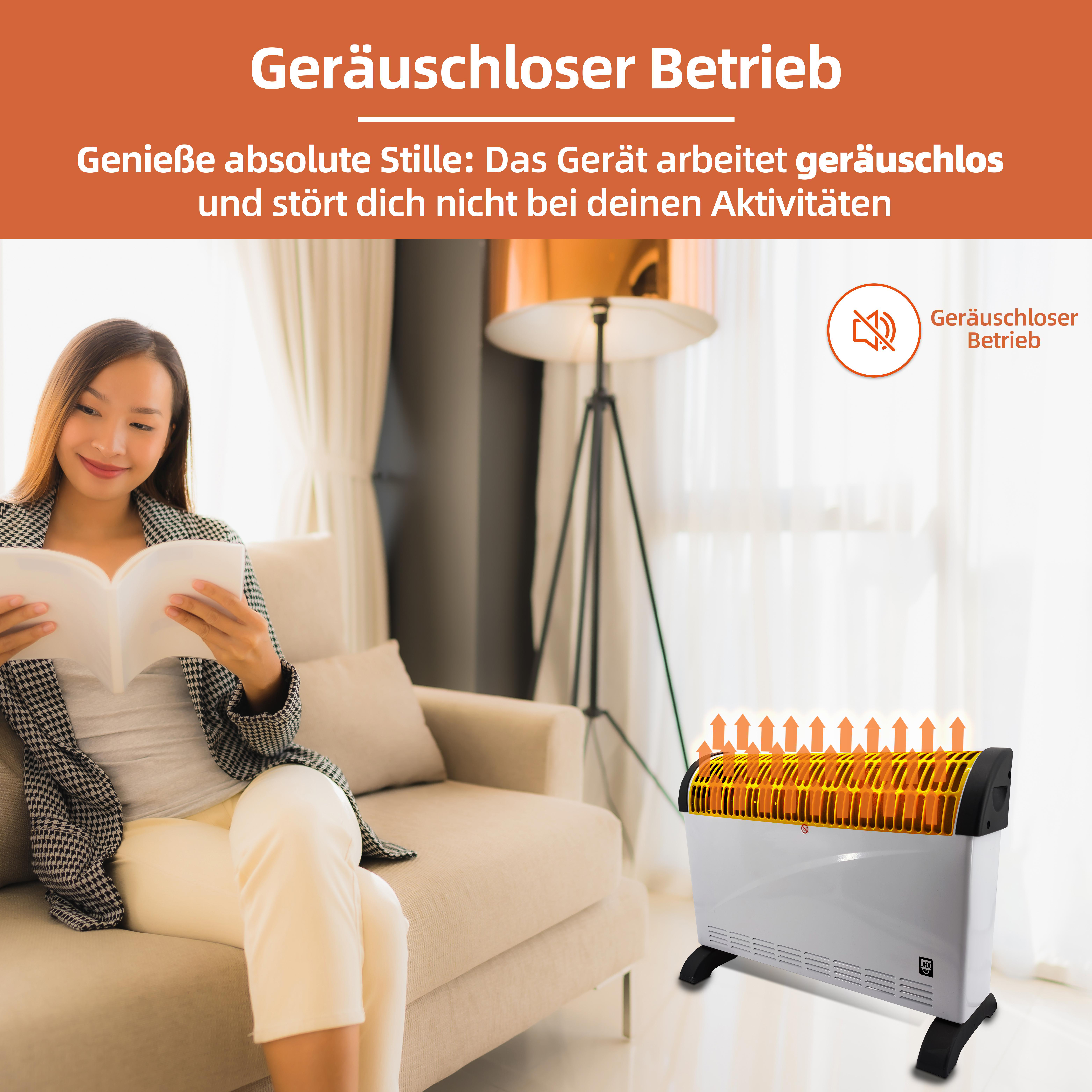 Eine Frau liest ein Buch in der Nähe eines weißen Heizgeräts. Das Heizgerät hat einen schwarzen Sockel und eine orangefarbene Oberseite.