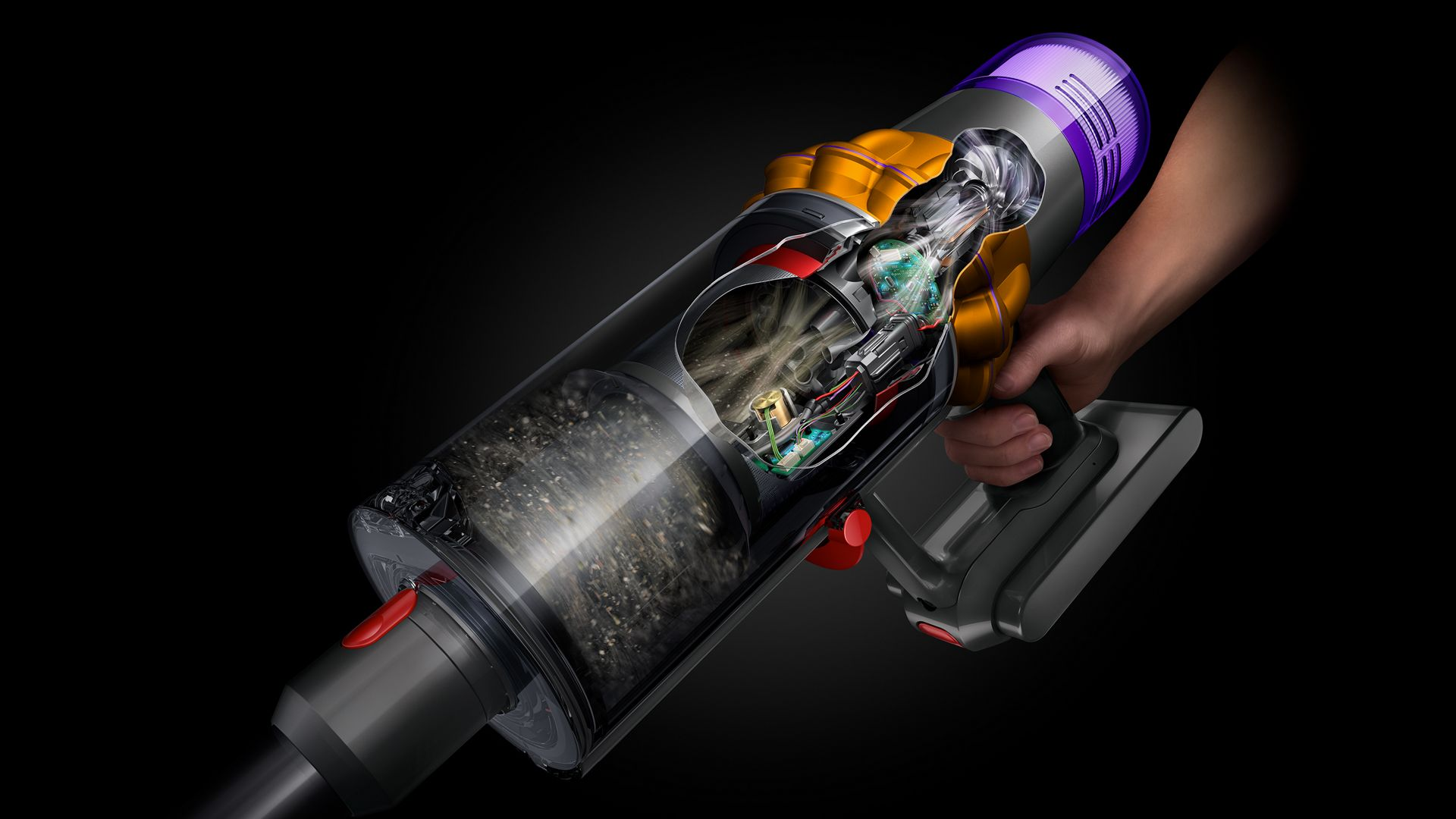 Dyson kablosuz elektrikli süpürgesinin kesiti, iç parçaları gösteriyor, siyah zemin.