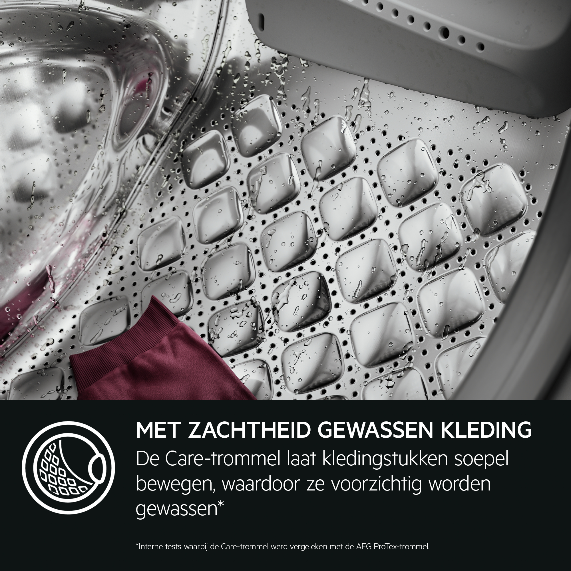Washing machine drum interior with a maroon garment, and water droplets visible.