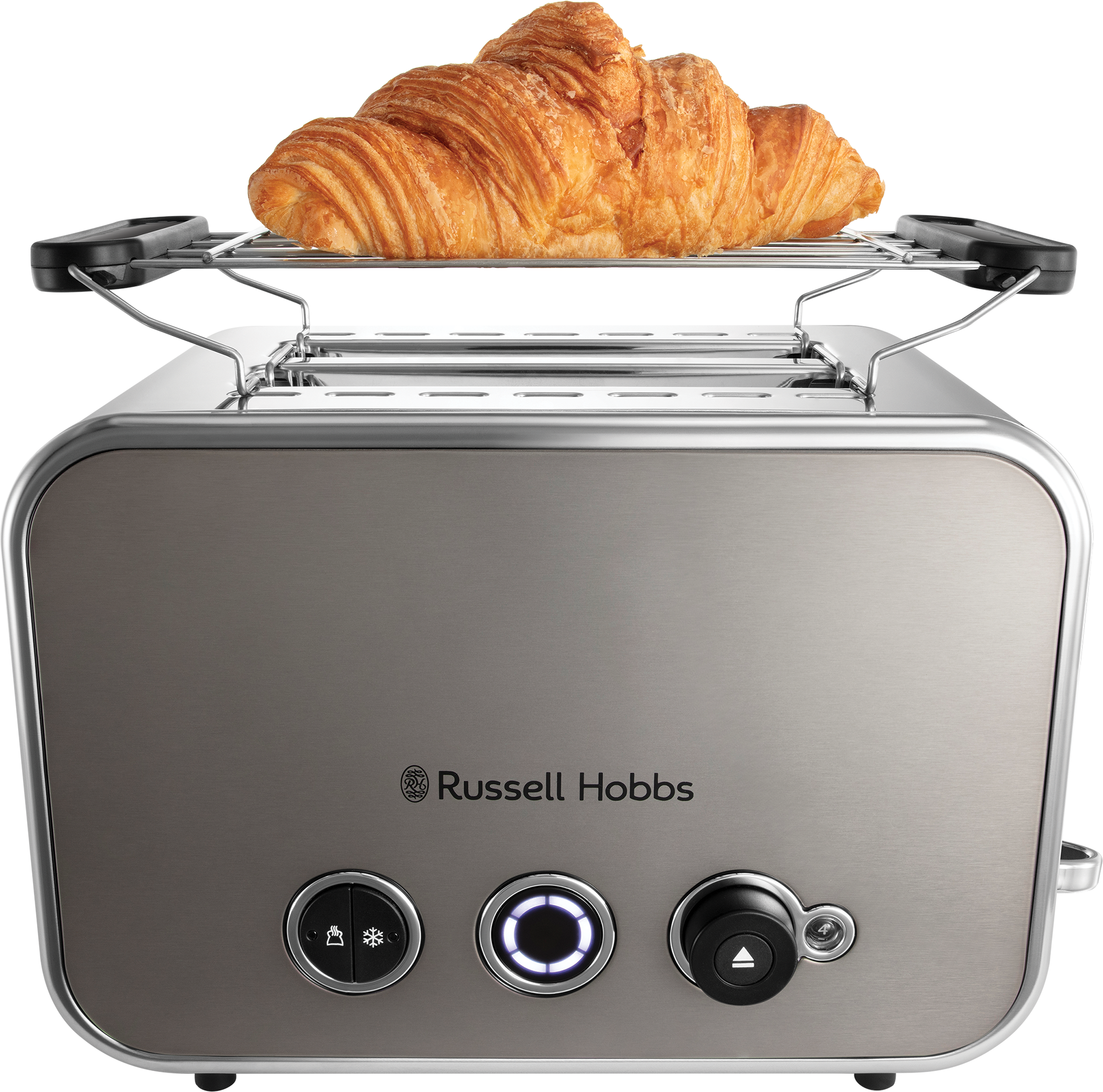 Egy kenyérpirító egy arany croissant-val a tetején, fekete háttérrel.