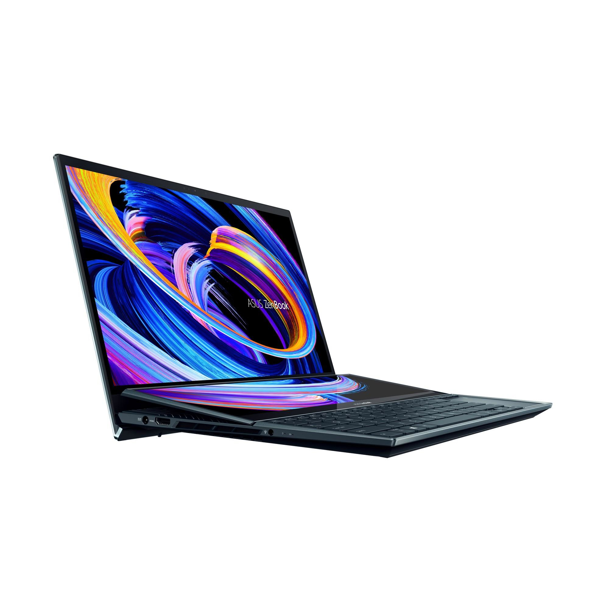 Portátil con pantalla azul oscuro y teclado gris oscuro, abierto sobre fondo blanco.