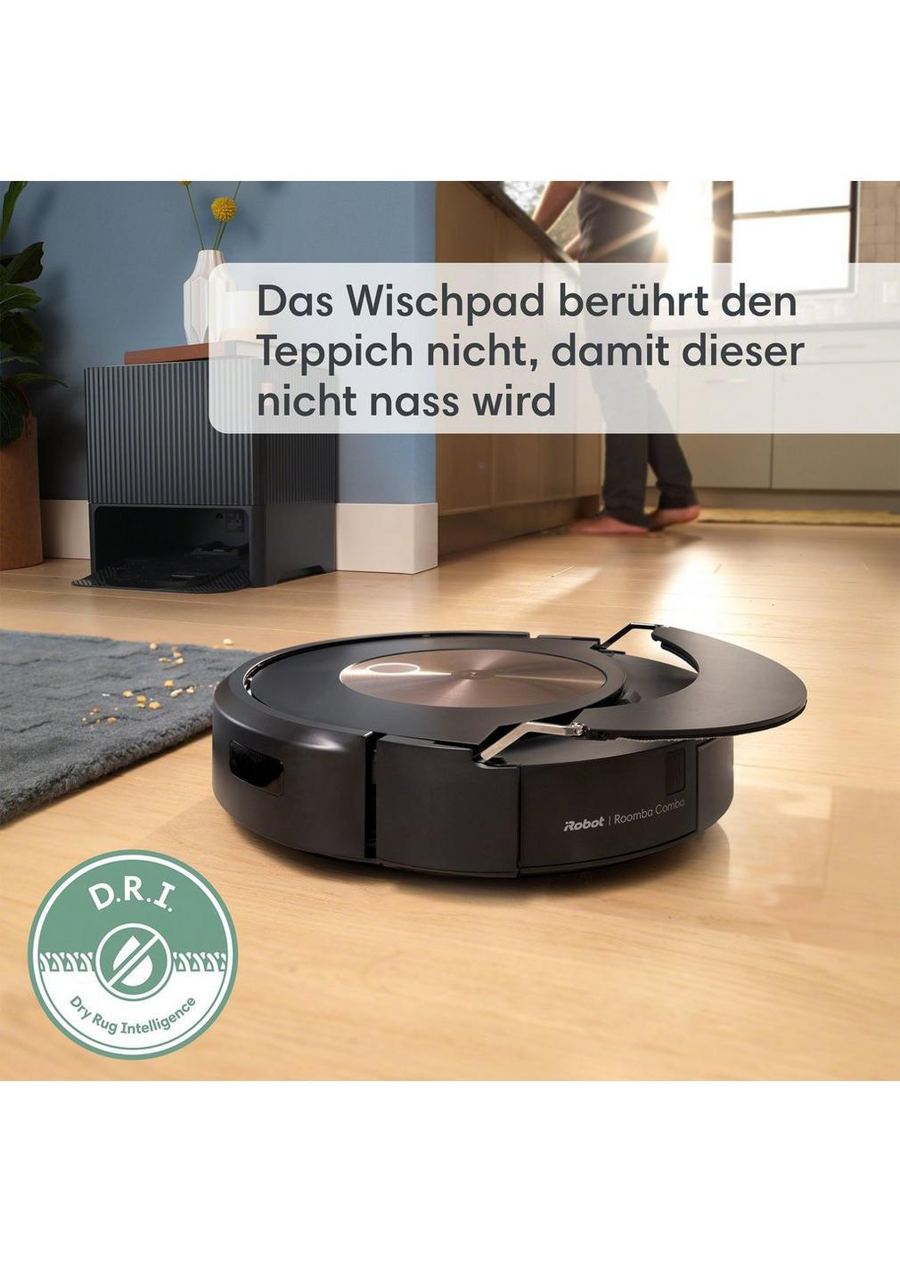 Roboter-Staubsauger. Schwarz, rund, und der Text sagt, dass er den Teppich nicht benetzt.