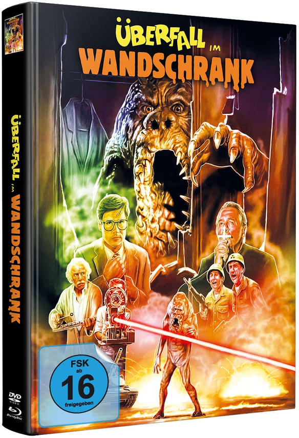 DVD-Cover mit Monster, Personen und Text auf Deutsch auf schwarzem Case.