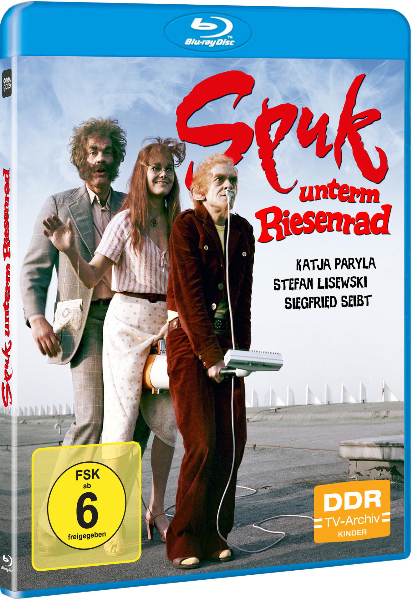Filmcover: Drei Personen in Retro-Kleidung. Der Titel ist rot: Spuk unterm Riesenrad. Eine Blu-ray Disc ist sichtbar.