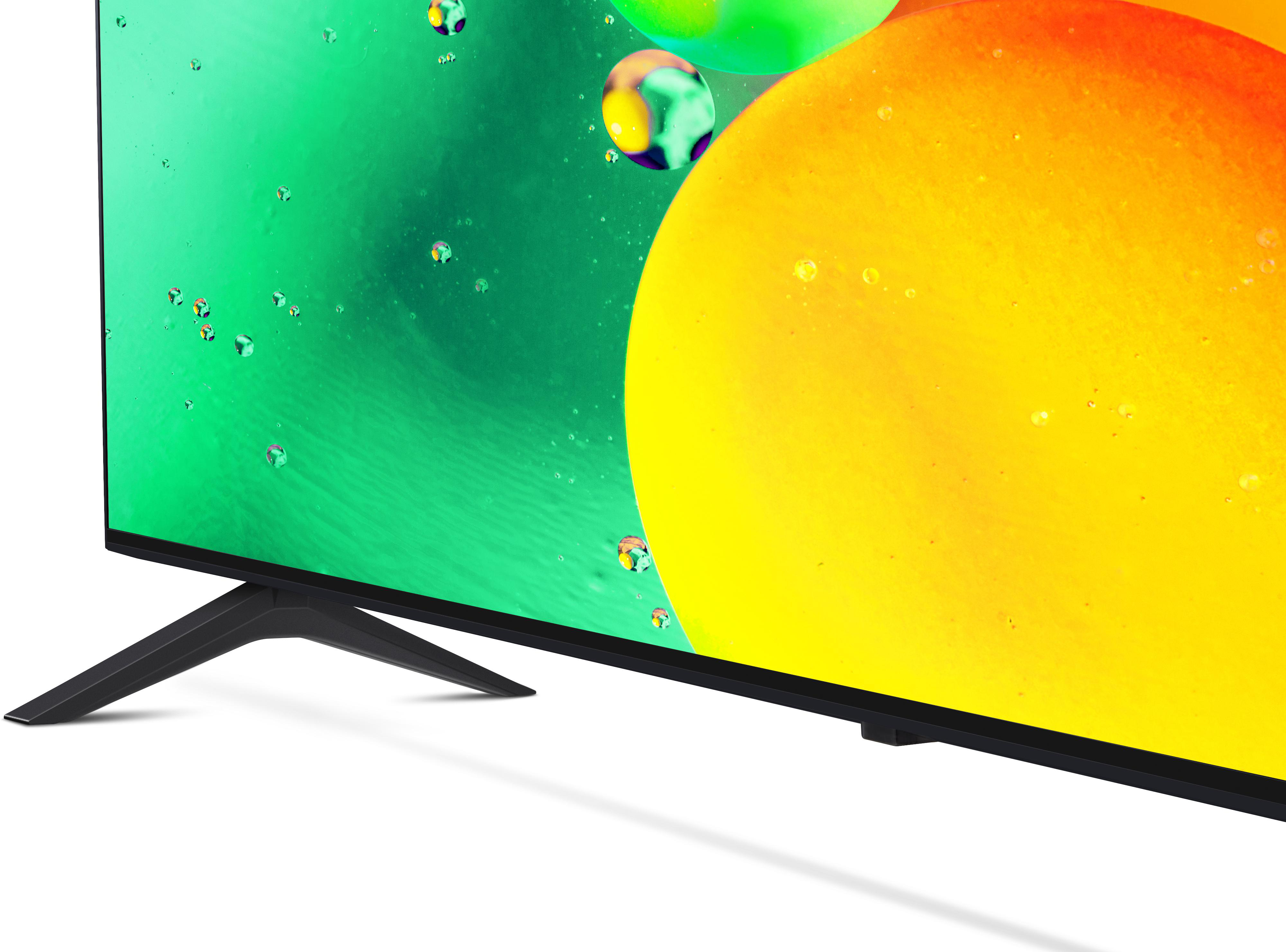 Ein moderner Fernseher mit schwarzem Ständer, der einen bunten abstrakten Hintergrund zeigt.