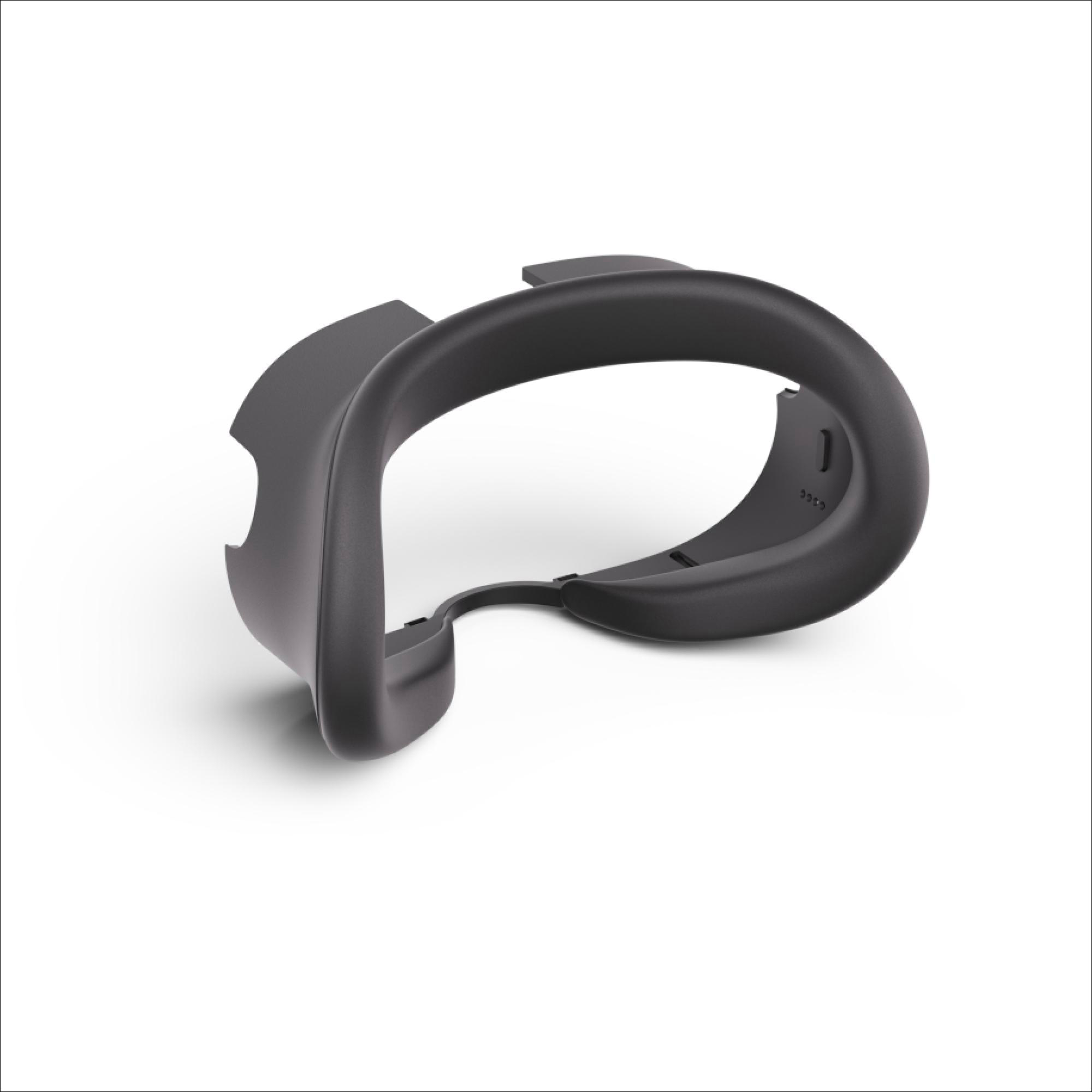 Schwarze Gesichtsabdeckung für ein VR-Headset, gebogen und mit Öffnungen.