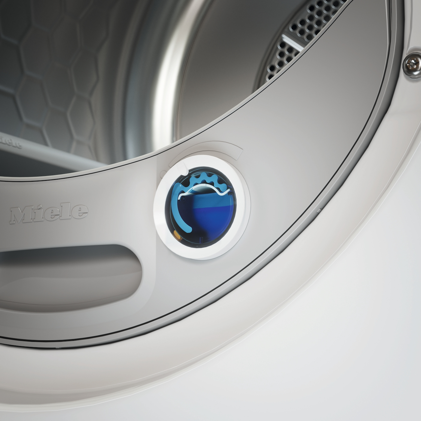 Detailansicht eines Miele Trockners mit blauem Wasserstandsanzeiger.