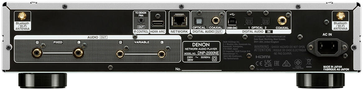 Rückansicht eines Denon Netzwerk-Audioplayers mit verschiedenen Ein-/Ausgängen.