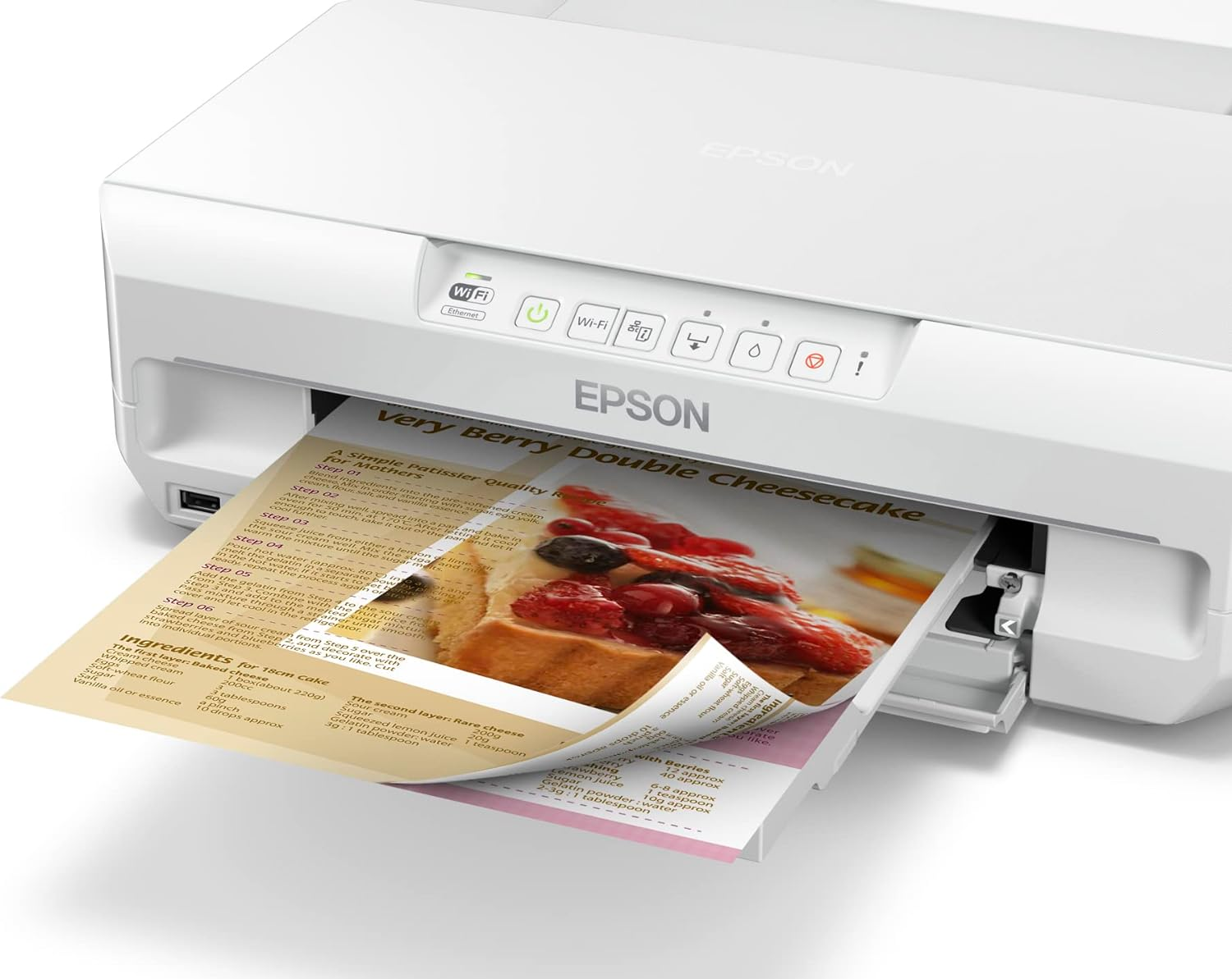 Impresora Epson imprimiendo una receta de tarta de queso, toma de cerca.