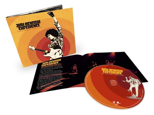 Jimi Hendrix Albumcover. Oranger Hintergrund mit dem Künstler, der Gitarre spielt. Geöffnete CD-Hülle.
